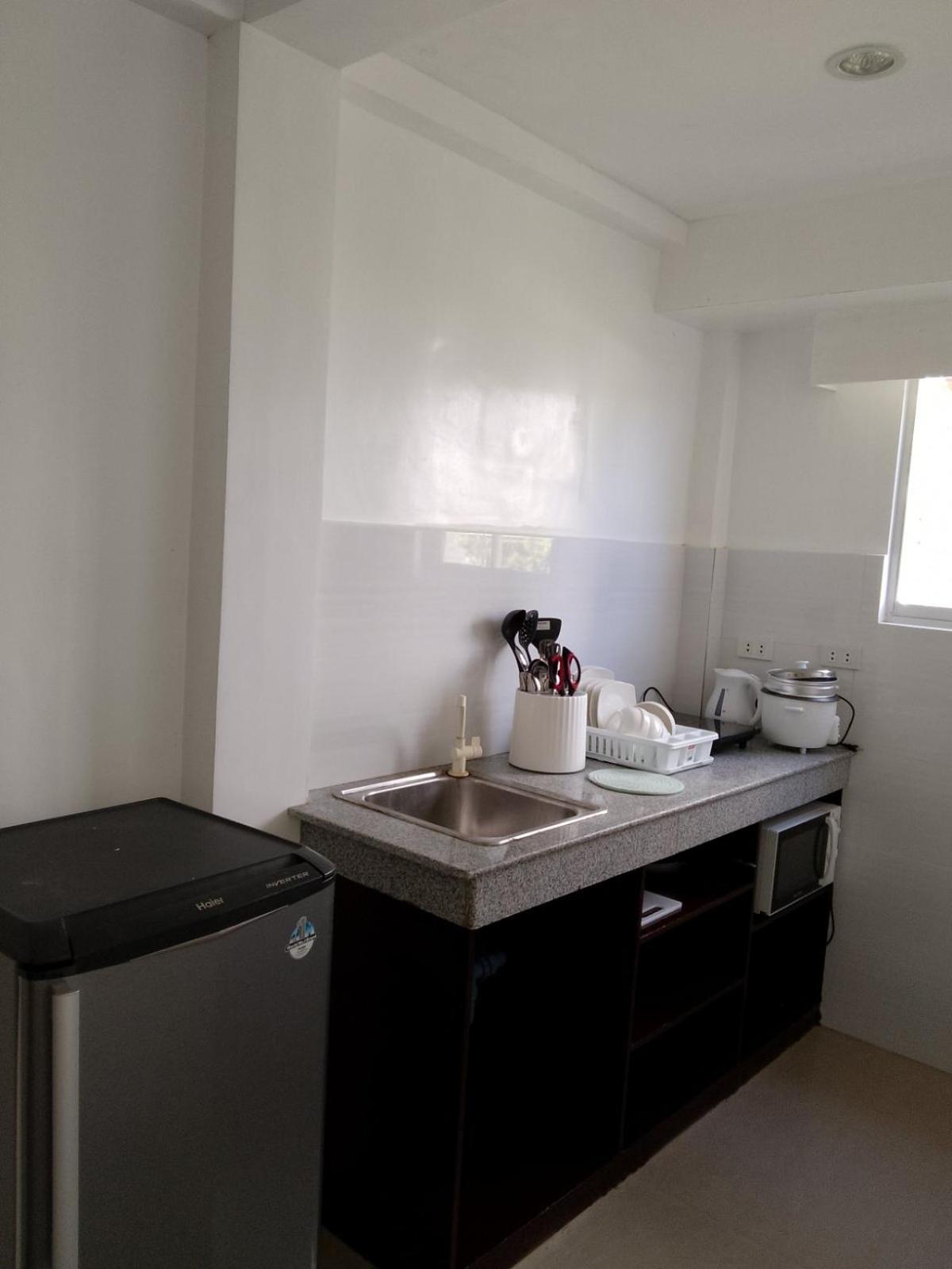 Heartland Hotel Serviced Rooms & Apartments. Panglao-stad Buitenkant foto