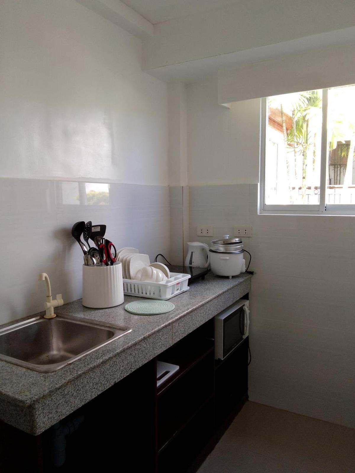Heartland Hotel Serviced Rooms & Apartments. Panglao-stad Buitenkant foto