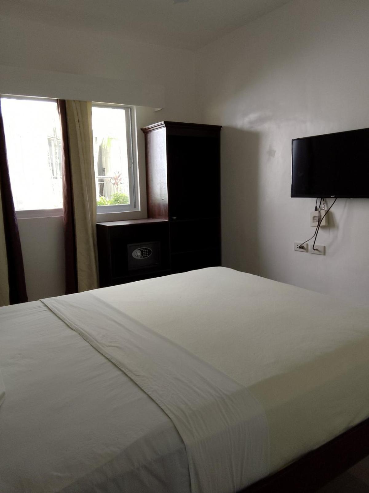 Heartland Hotel Serviced Rooms & Apartments. Panglao-stad Buitenkant foto