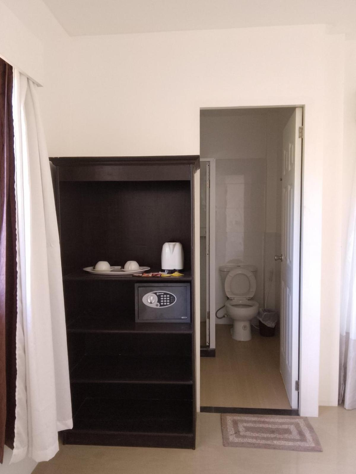 Heartland Hotel Serviced Rooms & Apartments. Panglao-stad Buitenkant foto