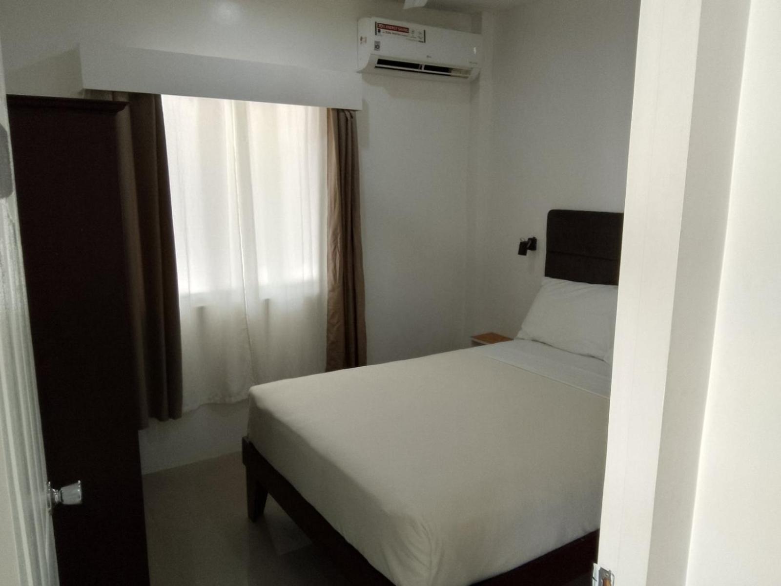 Heartland Hotel Serviced Rooms & Apartments. Panglao-stad Buitenkant foto