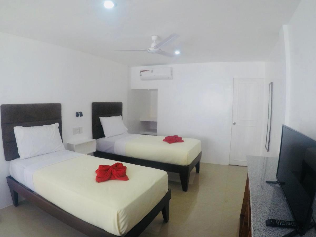 Heartland Hotel Serviced Rooms & Apartments. Panglao-stad Buitenkant foto