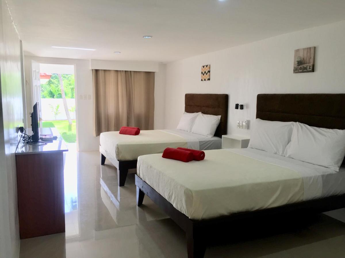 Heartland Hotel Serviced Rooms & Apartments. Panglao-stad Buitenkant foto