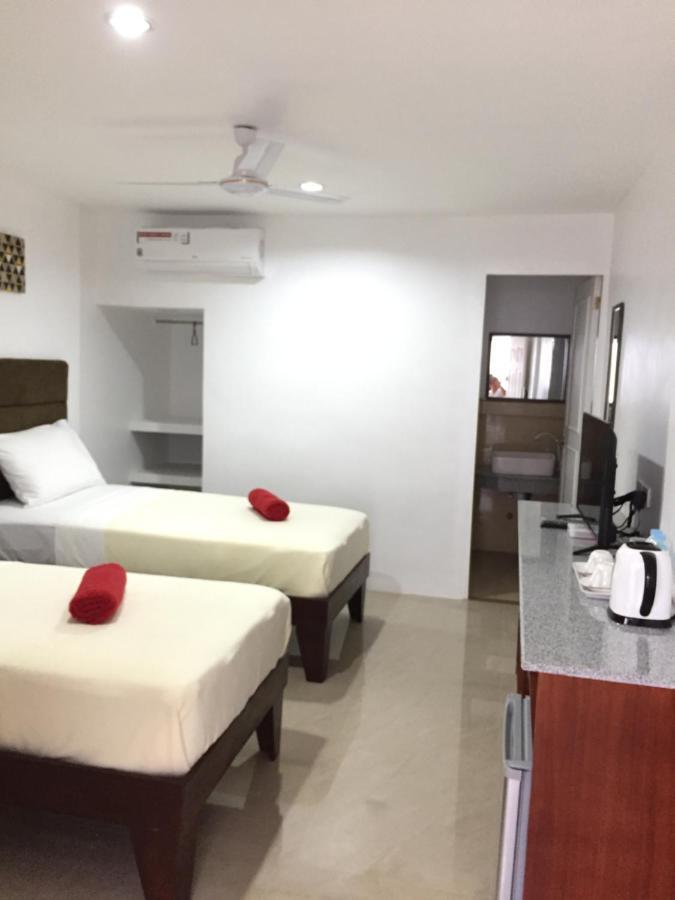 Heartland Hotel Serviced Rooms & Apartments. Panglao-stad Buitenkant foto