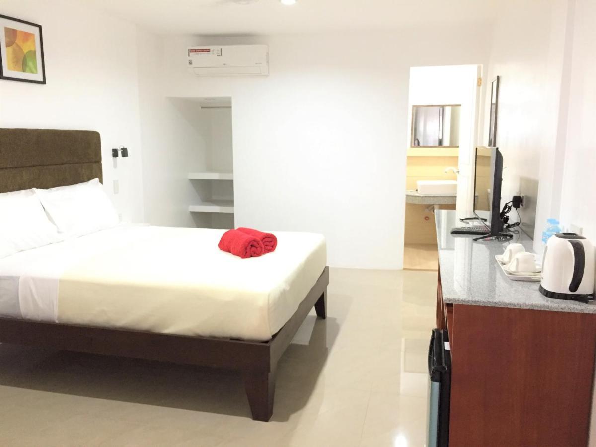 Heartland Hotel Serviced Rooms & Apartments. Panglao-stad Buitenkant foto