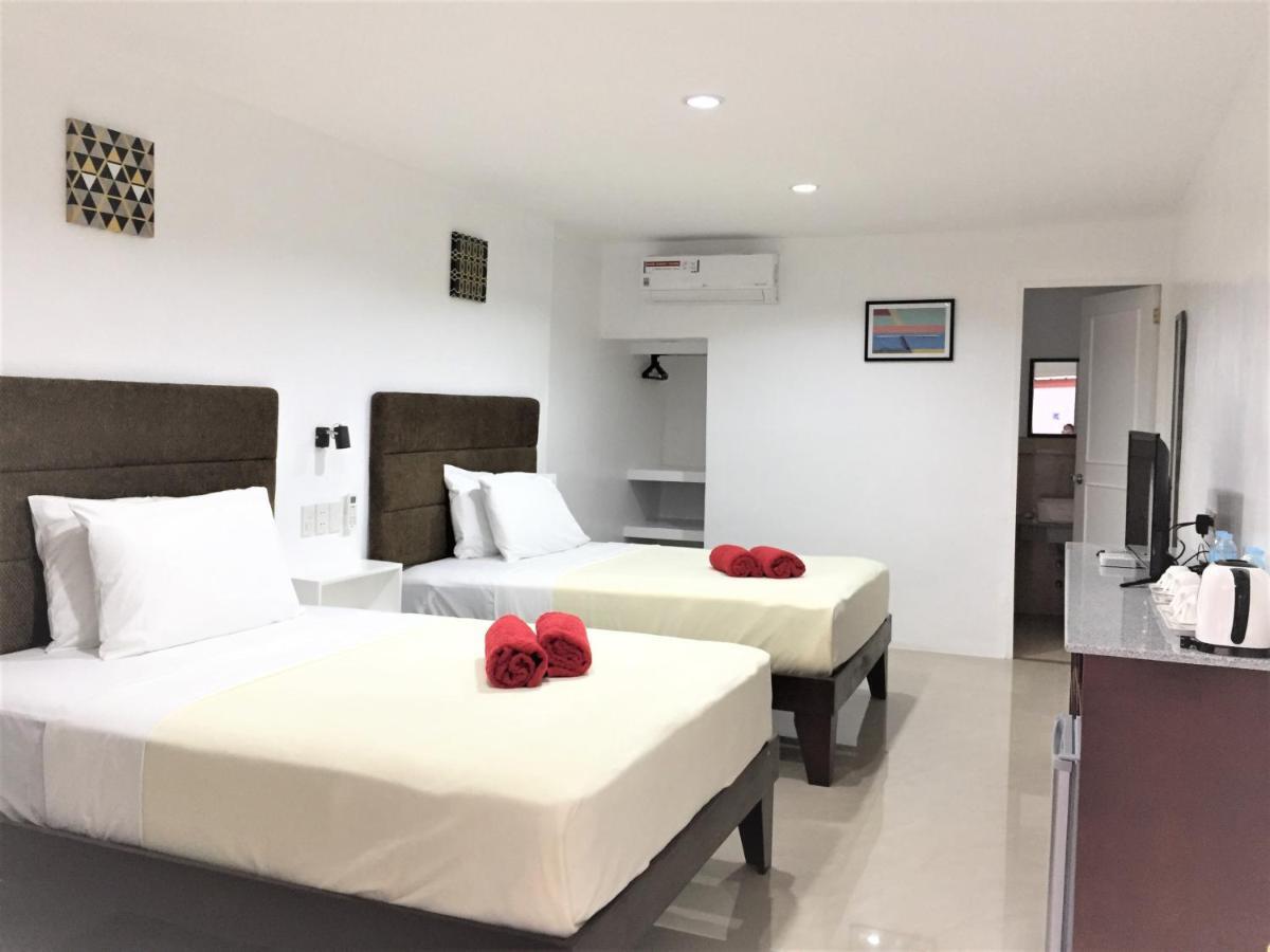 Heartland Hotel Serviced Rooms & Apartments. Panglao-stad Buitenkant foto