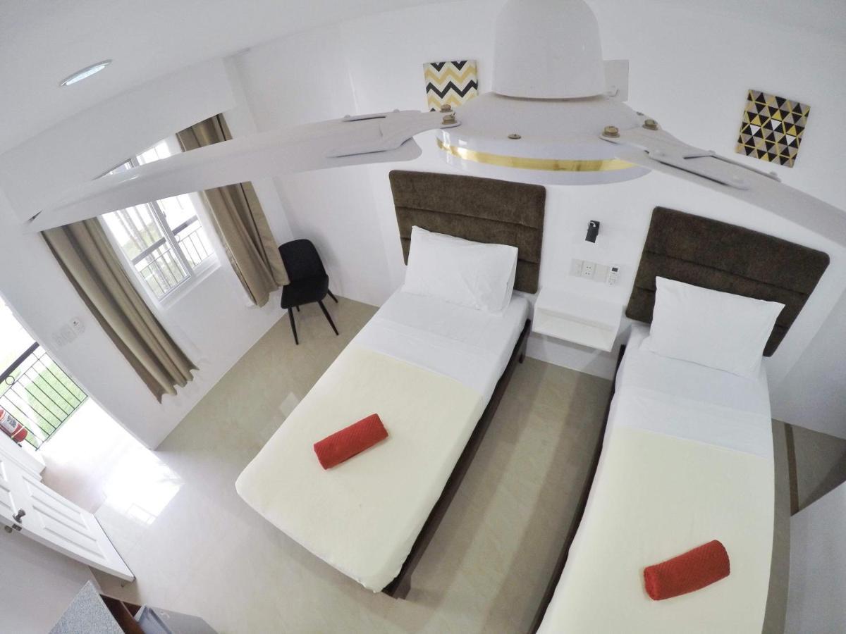 Heartland Hotel Serviced Rooms & Apartments. Panglao-stad Buitenkant foto